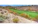 Scenic golf course with lush green grass and desert landscaping providing a serene environment at 2429 Anderson Park Dr, Henderson, NV 89044