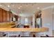 Modern kitchen boasts stainless steel appliances, granite countertops, a functional island, and ample cabinet space at 2429 Anderson Park Dr, Henderson, NV 89044