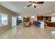 Open concept living space featuring a dining table, bar and kitchen at 2429 Anderson Park Dr, Henderson, NV 89044