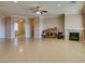 Large living room with tile floors, fireplace and access to other rooms at 2429 Anderson Park Dr, Henderson, NV 89044