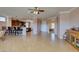 Open concept living space with tile flooring and lots of natural light at 2429 Anderson Park Dr, Henderson, NV 89044