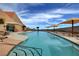 Relaxing pool with patio furniture and mountain views at 2429 Anderson Park Dr, Henderson, NV 89044