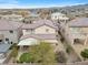 Aerial view of house and backyard with putting green at 2571 Hazelburn Ave, Henderson, NV 89044