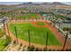 Community baseball field with grassy outfield at 2571 Hazelburn Ave, Henderson, NV 89044