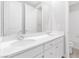 Clean bathroom with double vanity and white cabinetry at 2571 Hazelburn Ave, Henderson, NV 89044