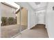 Bright entryway with hardwood floors and sliding glass doors leading to a patio at 2571 Hazelburn Ave, Henderson, NV 89044