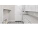 Bright laundry room with ample counter and cabinet space at 2571 Hazelburn Ave, Henderson, NV 89044