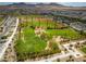 Landscaped park with grassy areas and seating at 2571 Hazelburn Ave, Henderson, NV 89044