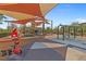 Community playground with shade structures, swings, and play equipment at 2571 Hazelburn Ave, Henderson, NV 89044