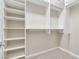 Spacious walk-in closet with hanging rods and shelving at 2571 Hazelburn Ave, Henderson, NV 89044