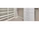 Large walk-in closet with shelving and drawers at 2571 Hazelburn Ave, Henderson, NV 89044