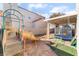 Backyard with covered patio, playset, and trampoline at 2789 Trotwood Ln, Las Vegas, NV 89108