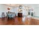 Bright dining area with hardwood floors and entryway view at 2789 Trotwood Ln, Las Vegas, NV 89108