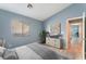 Bedroom with dresser and access to another room at 3008 Blush Noisette Ave, North Las Vegas, NV 89081