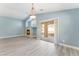 Living area with fireplace and sliding glass door at 3008 Blush Noisette Ave, North Las Vegas, NV 89081