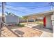 Large backyard with covered patio and storage shed at 309 Wisteria Ave, Las Vegas, NV 89107