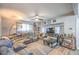 Living room features hardwood floors and a sectional sofa at 309 Wisteria Ave, Las Vegas, NV 89107