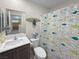 Bathroom with single vanity, toilet and shower/tub combo at 315 Bay Village Pl, Henderson, NV 89011