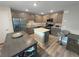 Modern kitchen with island and stainless steel appliances at 315 Bay Village Pl, Henderson, NV 89011