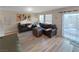 Living room with leather sofas and hardwood floors at 315 Bay Village Pl, Henderson, NV 89011