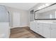 Elegant bathroom with double vanity and large mirror at 315 Rhiannon Ct, Las Vegas, NV 89183