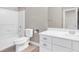 Clean bathroom with white vanity, toilet, and shower/tub combo at 315 Rhiannon Ct, Las Vegas, NV 89183