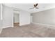 Spacious bedroom with carpeted floors and ceiling fan at 315 Rhiannon Ct, Las Vegas, NV 89183