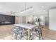 Dining area with concrete table and modern chairs, near kitchen at 315 Rhiannon Ct, Las Vegas, NV 89183