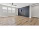 Living room with hardwood floors and a modern fireplace at 315 Rhiannon Ct, Las Vegas, NV 89183