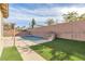 Inviting backyard oasis with a refreshing pool at 315 Rhiannon Ct, Las Vegas, NV 89183