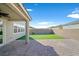 Covered patio and artificial turf backyard at 3494 Brezine Ave, Henderson, NV 89044