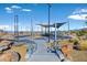 Modern playground with shaded areas and climbing structures at 3494 Brezine Ave, Henderson, NV 89044