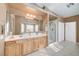 Elegant bathroom with double sinks and a walk-in shower at 3733 Via Di Girolamo Ave, Henderson, NV 89052