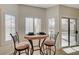 Cozy breakfast nook with window seat and sliding glass door at 3733 Via Di Girolamo Ave, Henderson, NV 89052