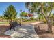 Relaxing community park with shaded seating and walking paths at 3733 Via Di Girolamo Ave, Henderson, NV 89052