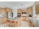 Modern kitchen with granite countertops and island at 3733 Via Di Girolamo Ave, Henderson, NV 89052