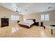 Large main bedroom with wood floors and plenty of natural light at 3733 Via Di Girolamo Ave, Henderson, NV 89052