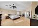 Bright main bedroom with hardwood floors and ceiling fan at 3733 Via Di Girolamo Ave, Henderson, NV 89052