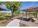 Community park with shaded seating and picnic area at 3733 Via Di Girolamo Ave, Henderson, NV 89052