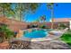 Relaxing pool with waterfall feature and spa at 3733 Via Di Girolamo Ave, Henderson, NV 89052