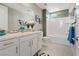 Modern bathroom with a tub and updated vanity at 4302 Swift St, Las Vegas, NV 89135