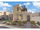 Stylish home with stone facade, landscaping, and walkway at 4302 Swift St, Las Vegas, NV 89135