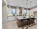 Modern kitchen with white cabinets, large island, and stainless steel appliances at 4302 Swift St, Las Vegas, NV 89135