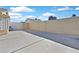 Large side yard with a concrete patio and gated access at 4318 Cobblehill Way, North Las Vegas, NV 89032