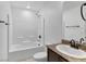 Bathroom with tub, shower, and granite vanity at 4543 Pencester St, Las Vegas, NV 89115