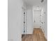 Clean hallway with doors to bedrooms and closets at 4543 Pencester St, Las Vegas, NV 89115