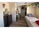 Inviting bedroom featuring a dresser, a desk, and modern flooring at 4559 S Nellis Blvd, Las Vegas, NV 89121
