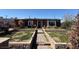 Charming home featuring a landscaped front yard with a brick walkway leading to the front door at 4559 S Nellis Blvd, Las Vegas, NV 89121