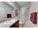 Clean bathroom, bathtub, shower, granite vanity at 4710 Blaise Ave # 101, North Las Vegas, NV 89084