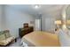 Spacious bedroom with dresser and ensuite access at 4710 Blaise Ave # 101, North Las Vegas, NV 89084